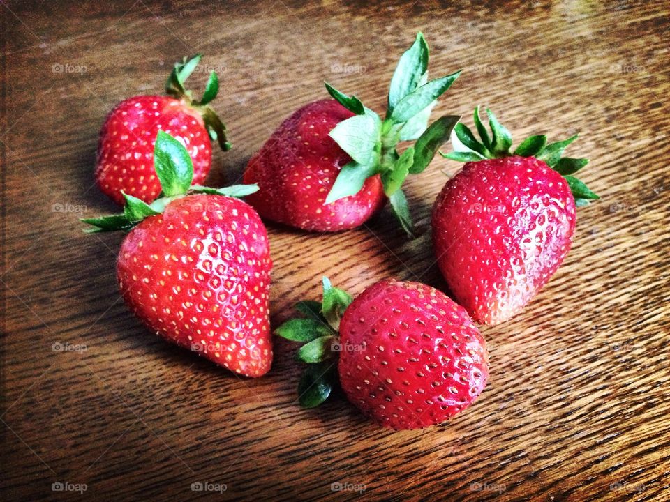 Fresh berries . Strawberries on the wood... 