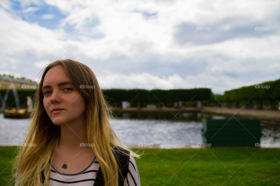 Beautiful girl in Peterhof Palace / Saint Petersburg / Russia