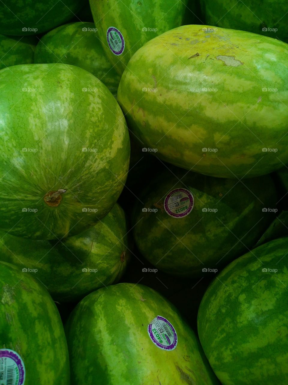 Green, round and ready to eat! Watermelons in all shapes and sizes. such a Delicious and Thirst Quenching Fruit!