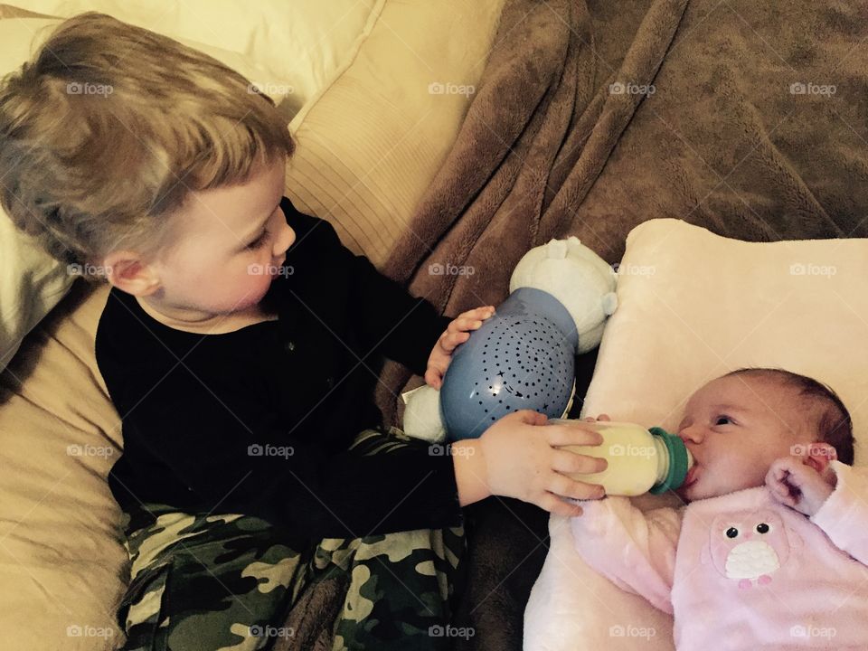 Big brother taking care of his newborn sissy, true love ❤️ 
