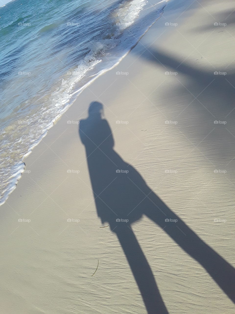 you know how to play with a shadow it always turns out that something unusual evening for this is the best time shadows are long and very unusual shapes