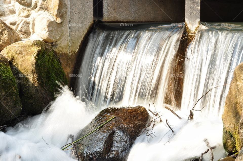 waterfall in the spring park in Poland