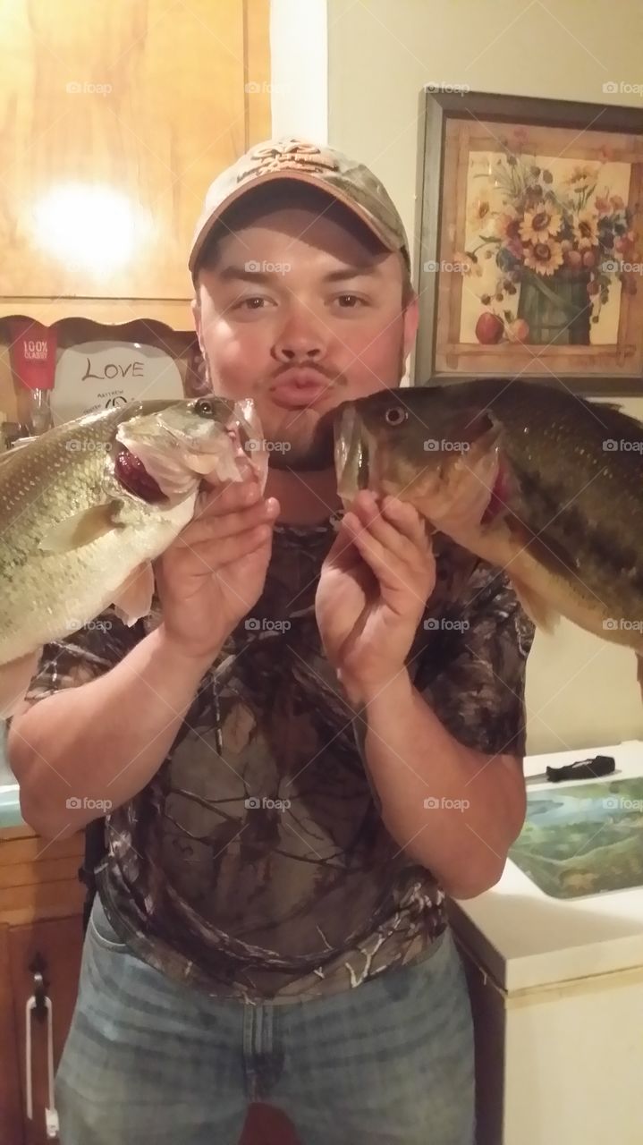fishy face. my friend and his catch 