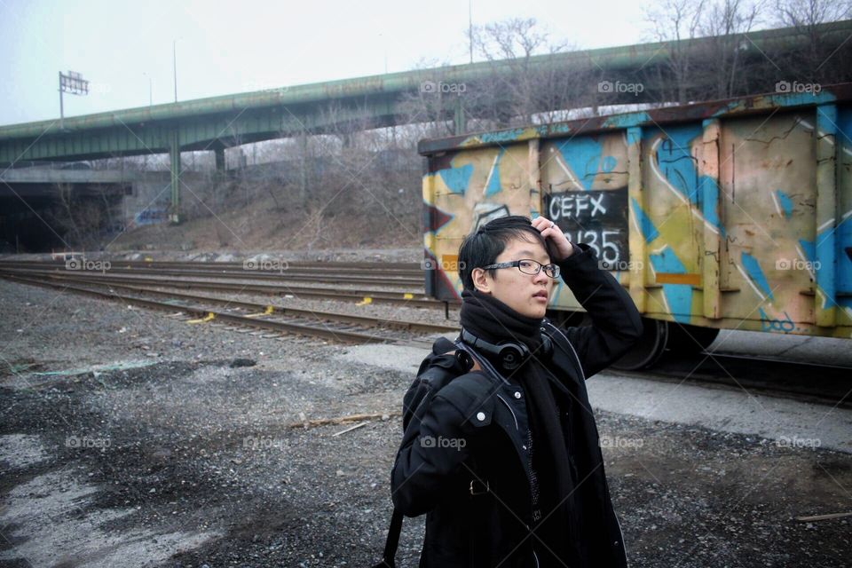 female posing in brooklyn’s abandoned industrial city construction yard