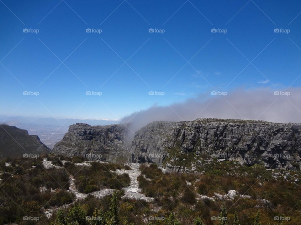 Cloud over the mountain and the blue sky