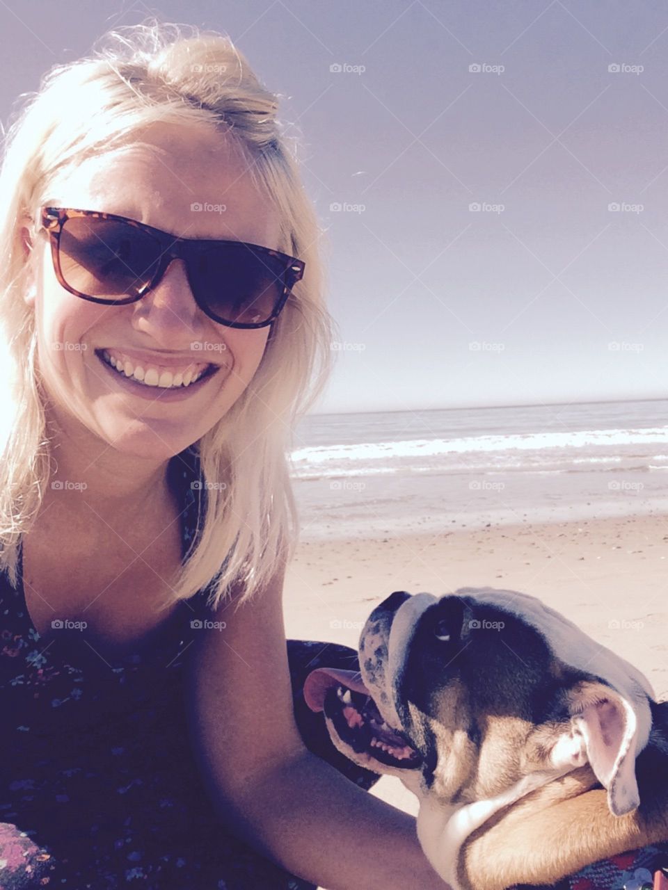 Bulldog and his momma. Beach lovers
