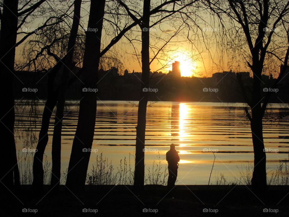 sunset over the city across the river