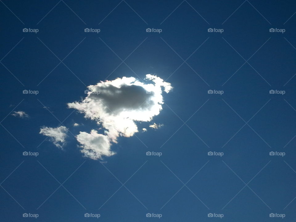 Cloud covering the sun. one blocking cloud disrupting a sunbathing moment.. still beautiful:)