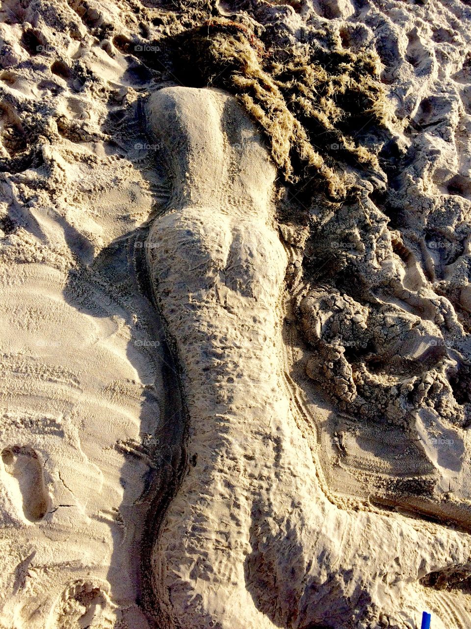Mermaid in the sand