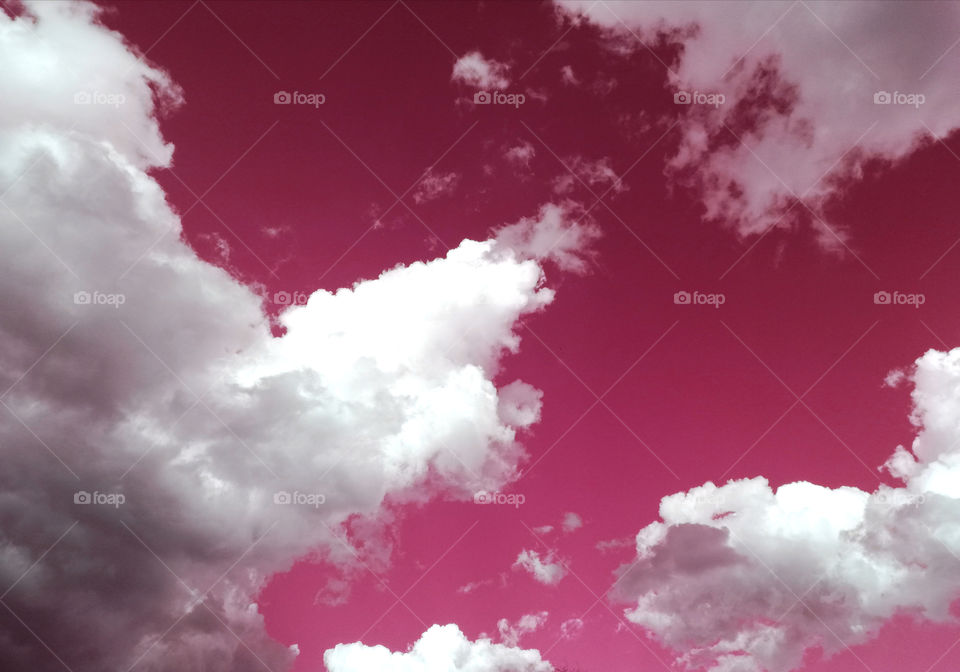 amazing pink sky with white clouds