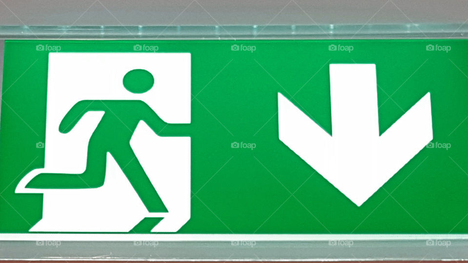 Green exit sign, arrow down 