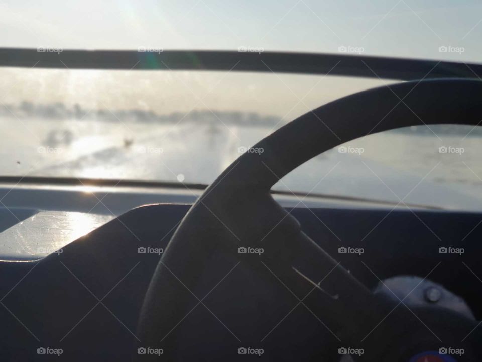 Recreational boating on the Oostvoornse lake. The Netherlands. Photo taken close up, piece of handlebars, for windshield boat of a Speedboat - Shakespeare