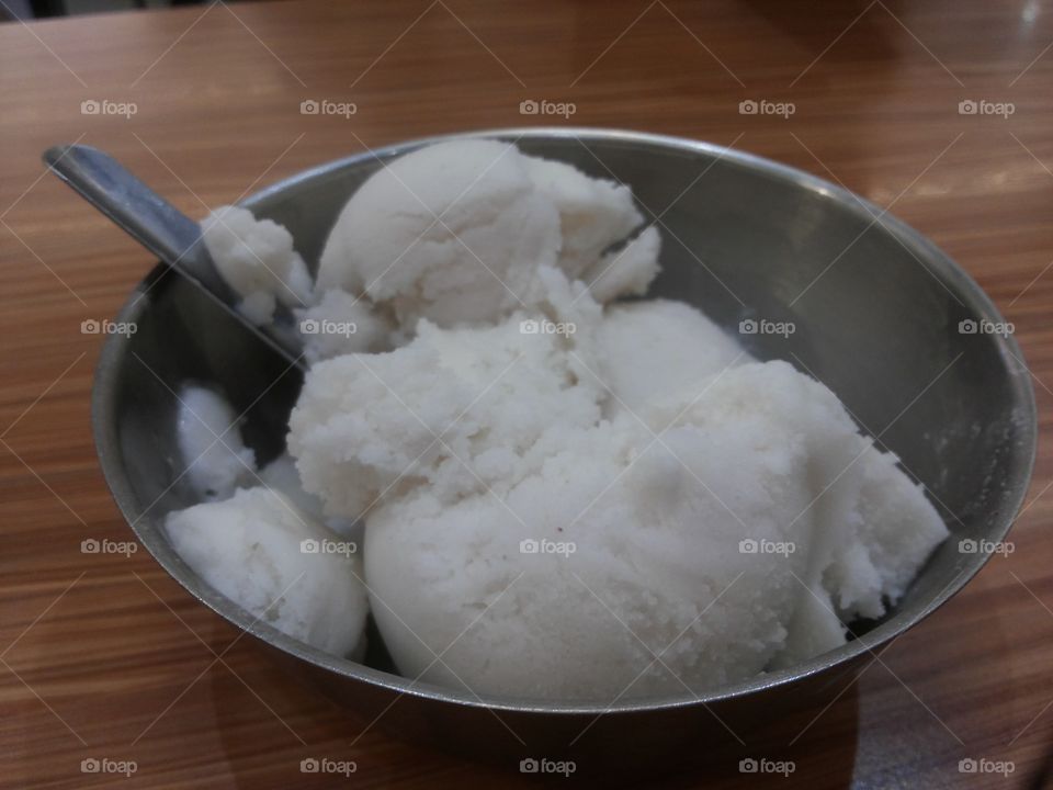Cool white sweet coconut icream for you. I enjoy eating it to fresh up my day. Sweet cool day.