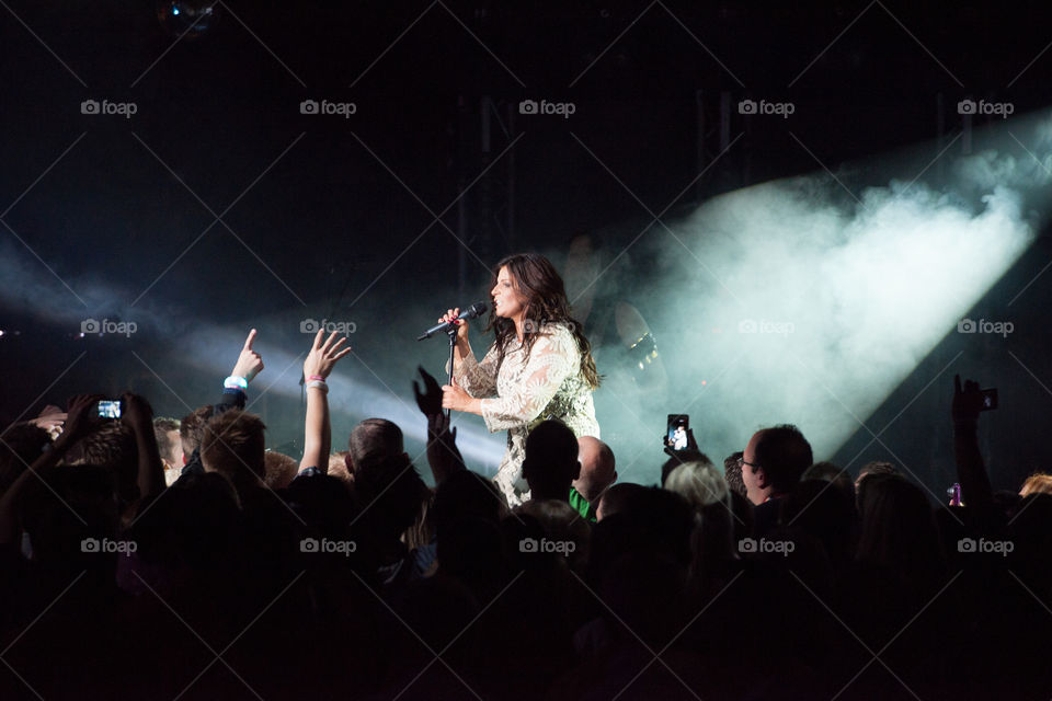 Swedish superstar Carola Häggkvist performing on stage in a nightclub in Malmö.