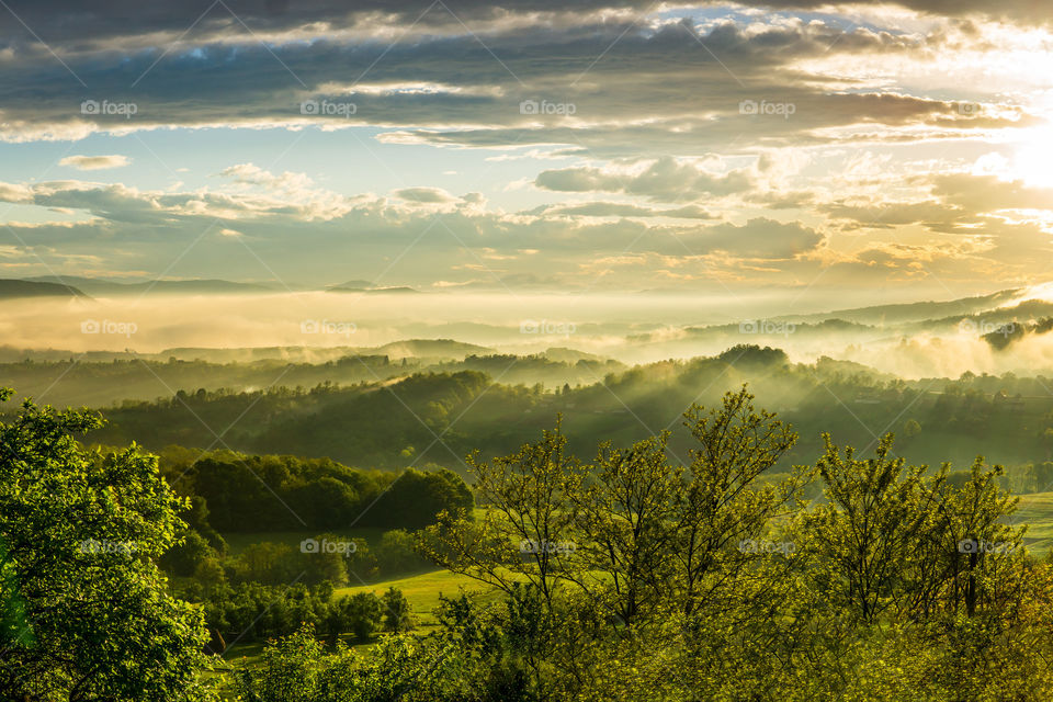 Sunset on foggy mountains in west Serbia