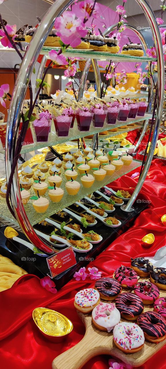 A colorful combinations of delicious π desserts on buffet is beautiful π chef made Special at the end of dinner. Food Exploring moments