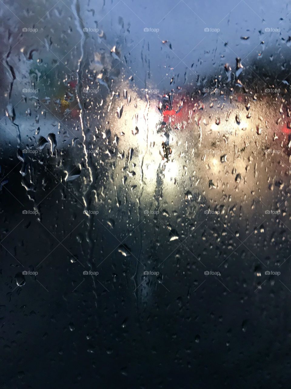 Raindrops on foggy glass 