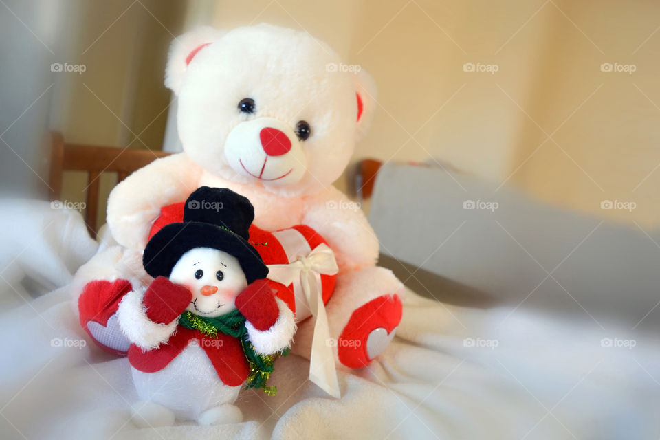 Teddy bear and snowman.