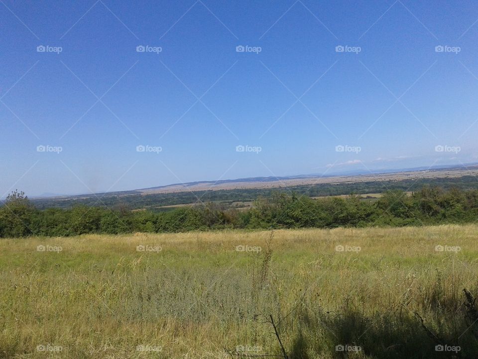 A blue smogless sky and the limitless country field, so close yet so far :)