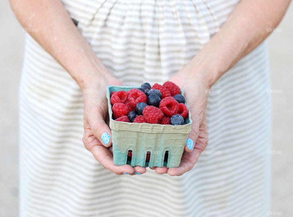 Woman holding berries