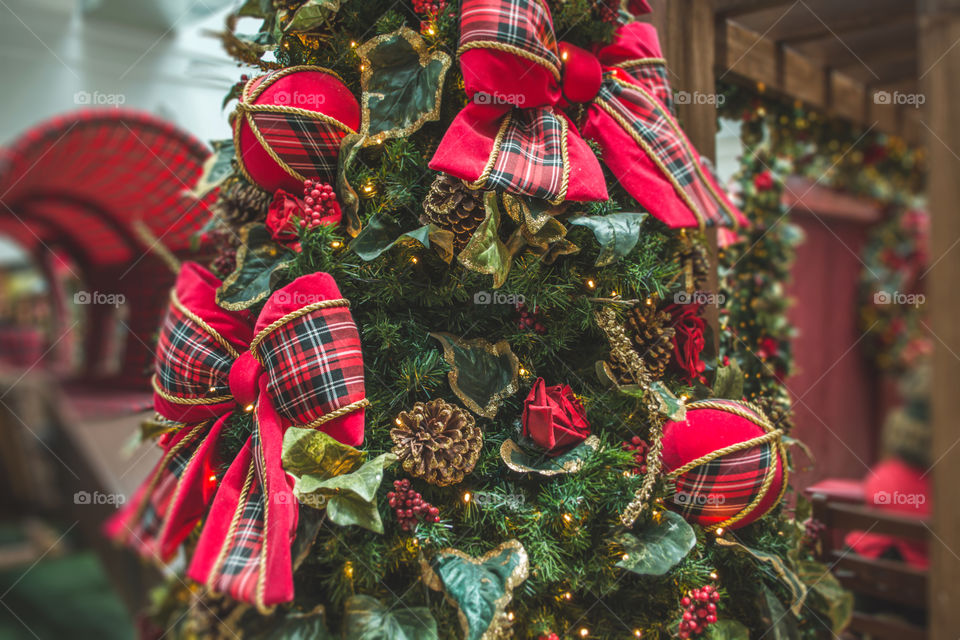 Christmas tree with Christmas decorations on the background