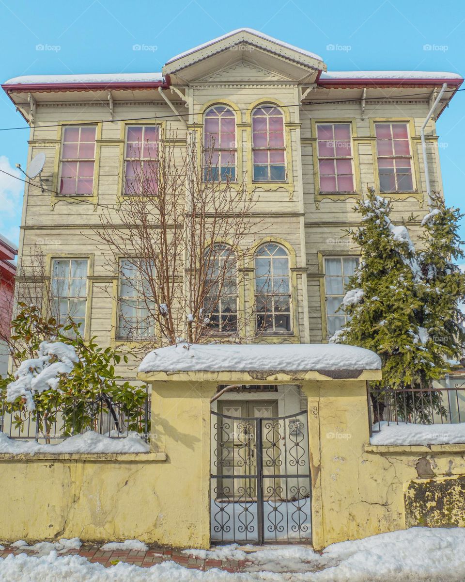 yellow old house