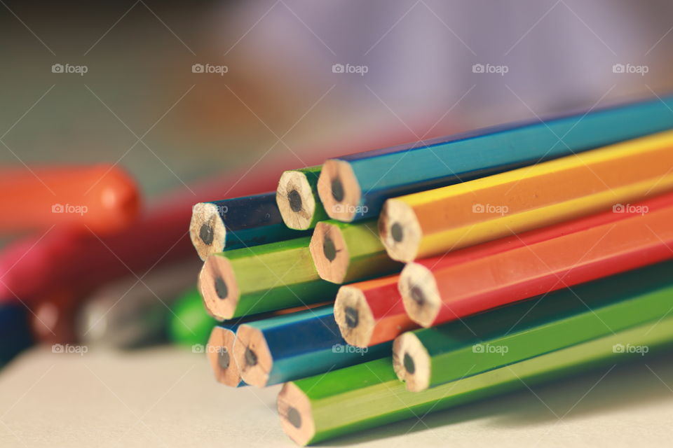 Graphite pencil 
graphite pencils are an important stationary items for students and kids and also for adults. Colourful pencils. Arranged symmetrically.