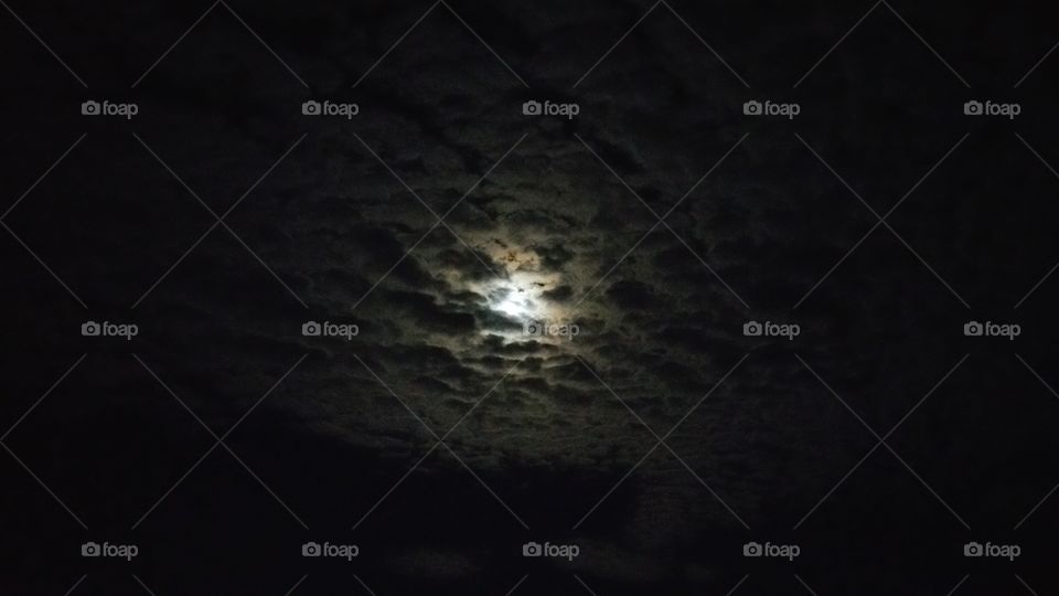 moon shine through the clouds