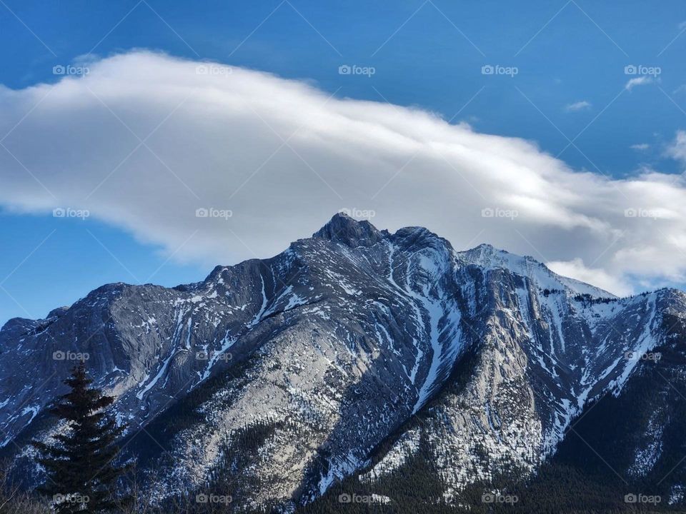 Clouds over the mountain tops