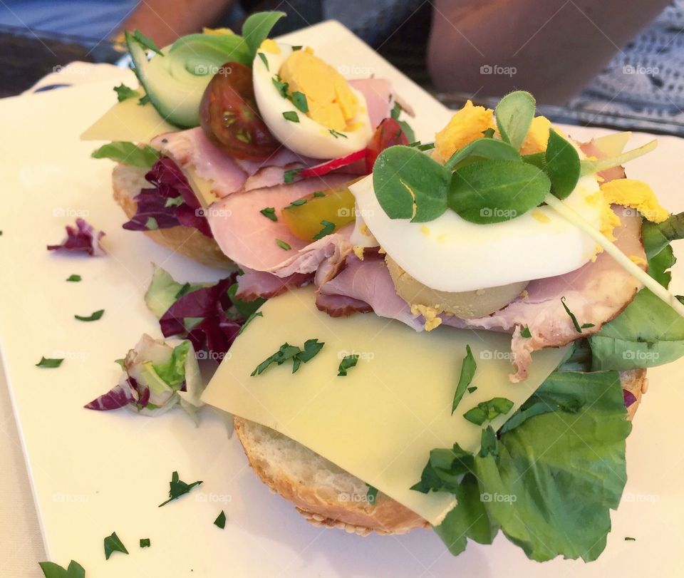 Colourful egg, ham, cheese and salad sandwich! 