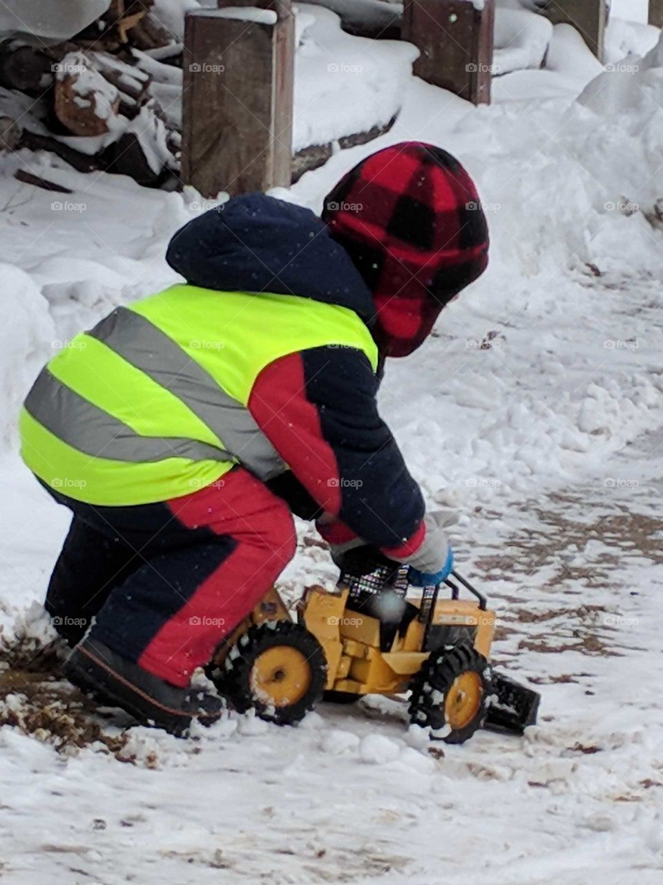 toddler driving skidder