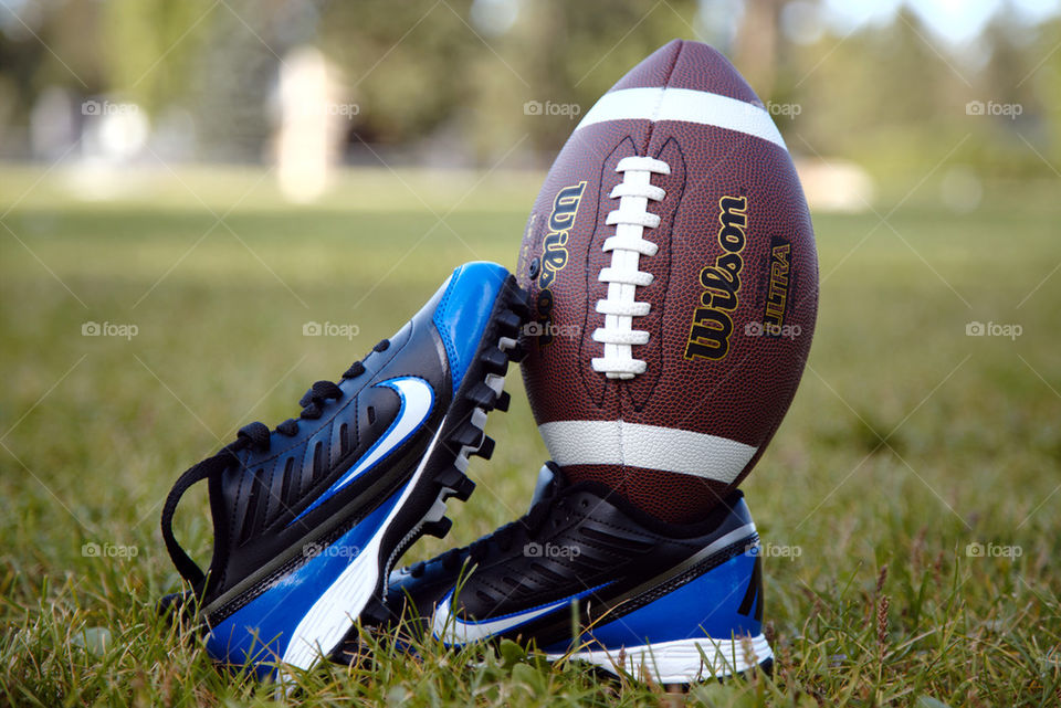 Football cleats and ball.