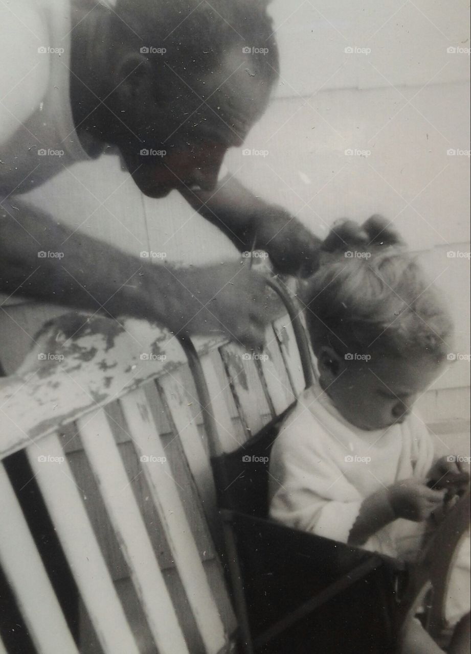 first cut. dad giving son first haircut 
