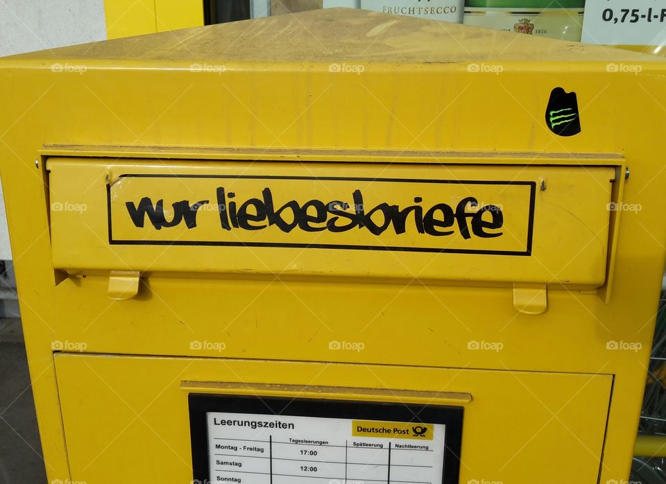 Sticker on yellow Mailbox ,only love letters', ,nur Liebesbriefe', german language