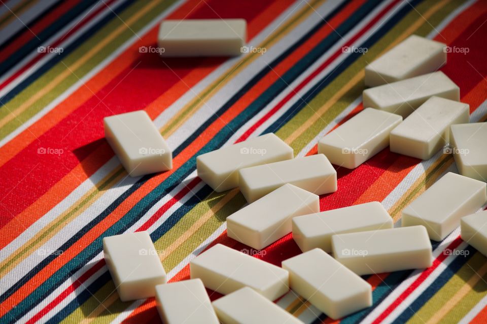 Game of dominoes on the table 