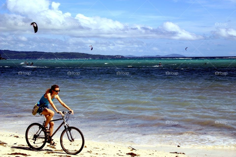Biker by the beach