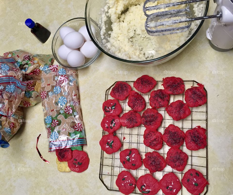 Making red holiday cookies 