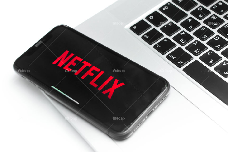 using Netflix, watching movies and TV series, logo