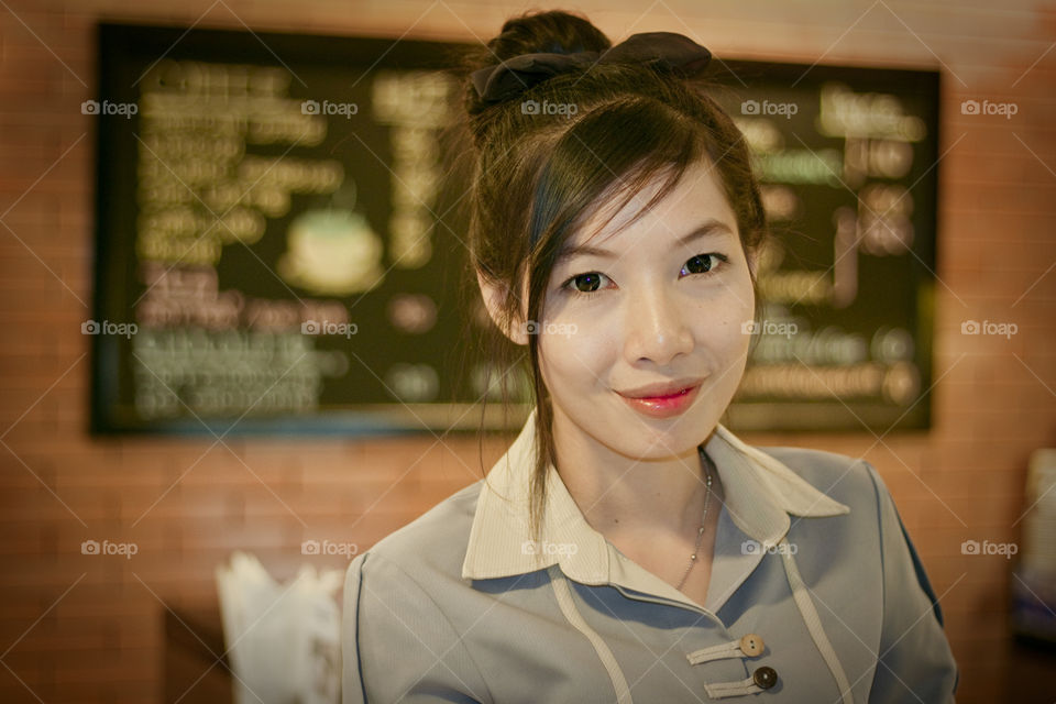 Portrait of a waitress. service staff at a coffee shop