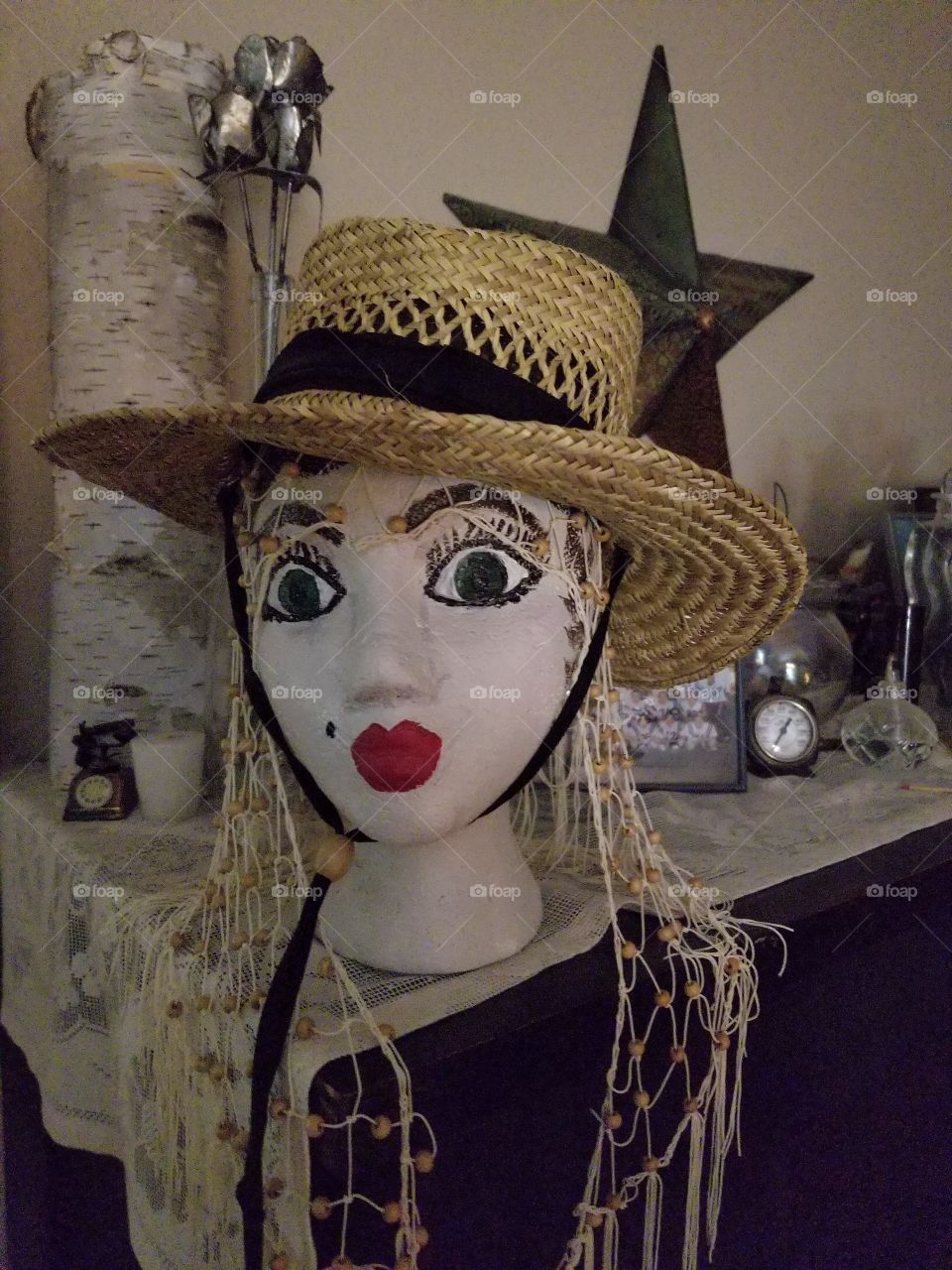 Female Mannequin head with hat and makeup creative funky art decor