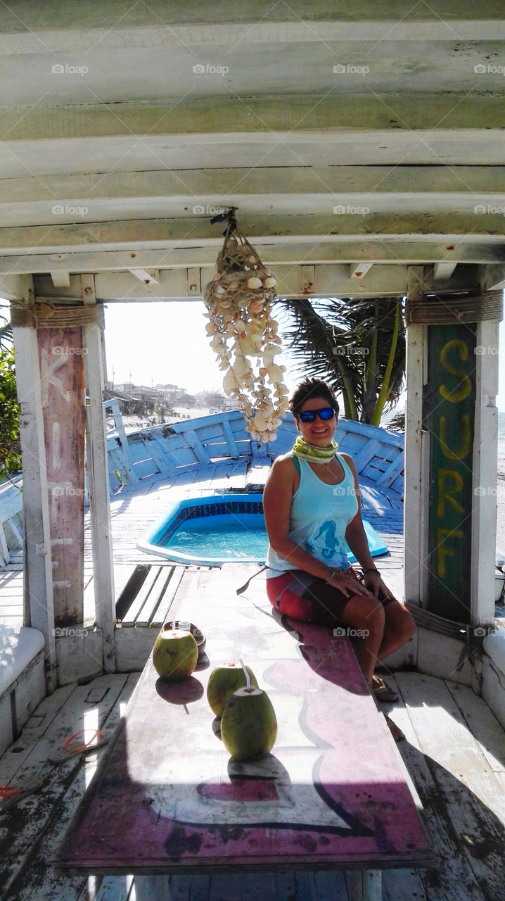 Woman in the boat parking in the beach. Jericoacoara Brazil 