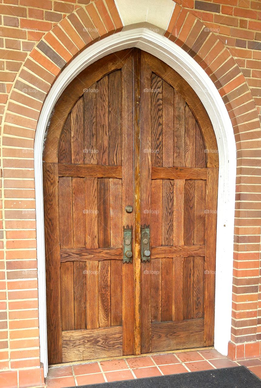 arched wood double doors