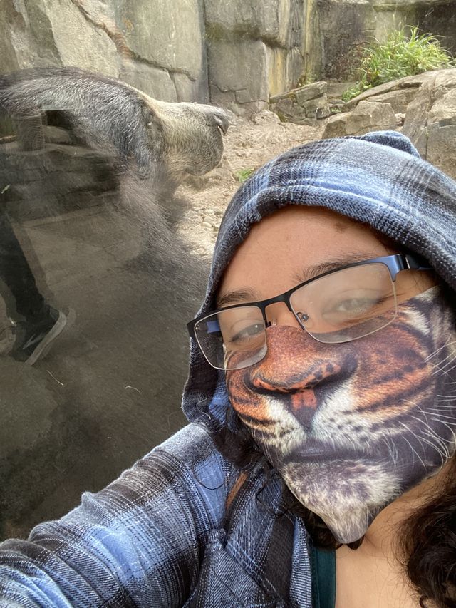 The bear and I, chilling at the zoo.