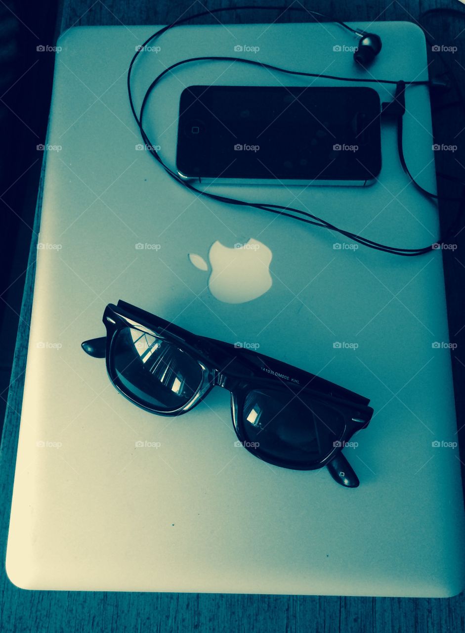 Apple product w/ sunglasses 