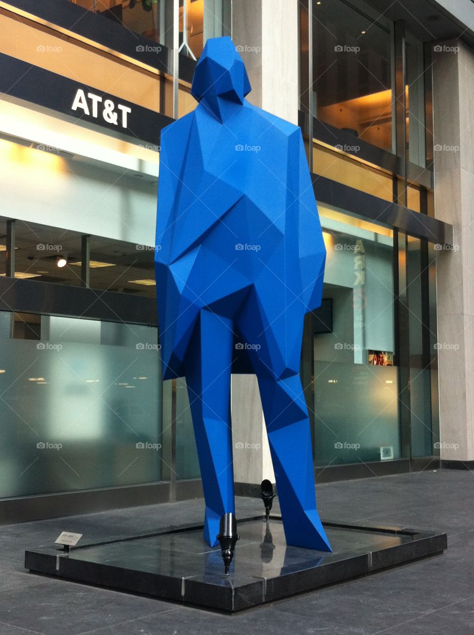 Big Blue Man statue by Xavier Veilhan on Seventh Avenue, NYC