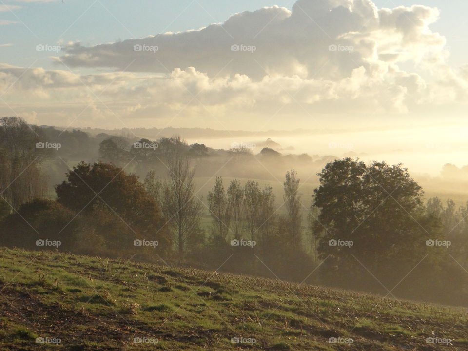 Scenic landscape against cloudy sky