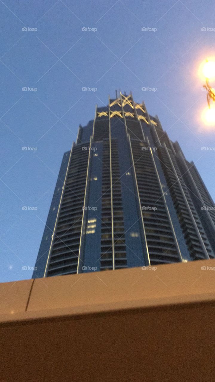 This is a big building, also in Dubai. I like the light/lamp in the top. It also shows a top of an bridge.