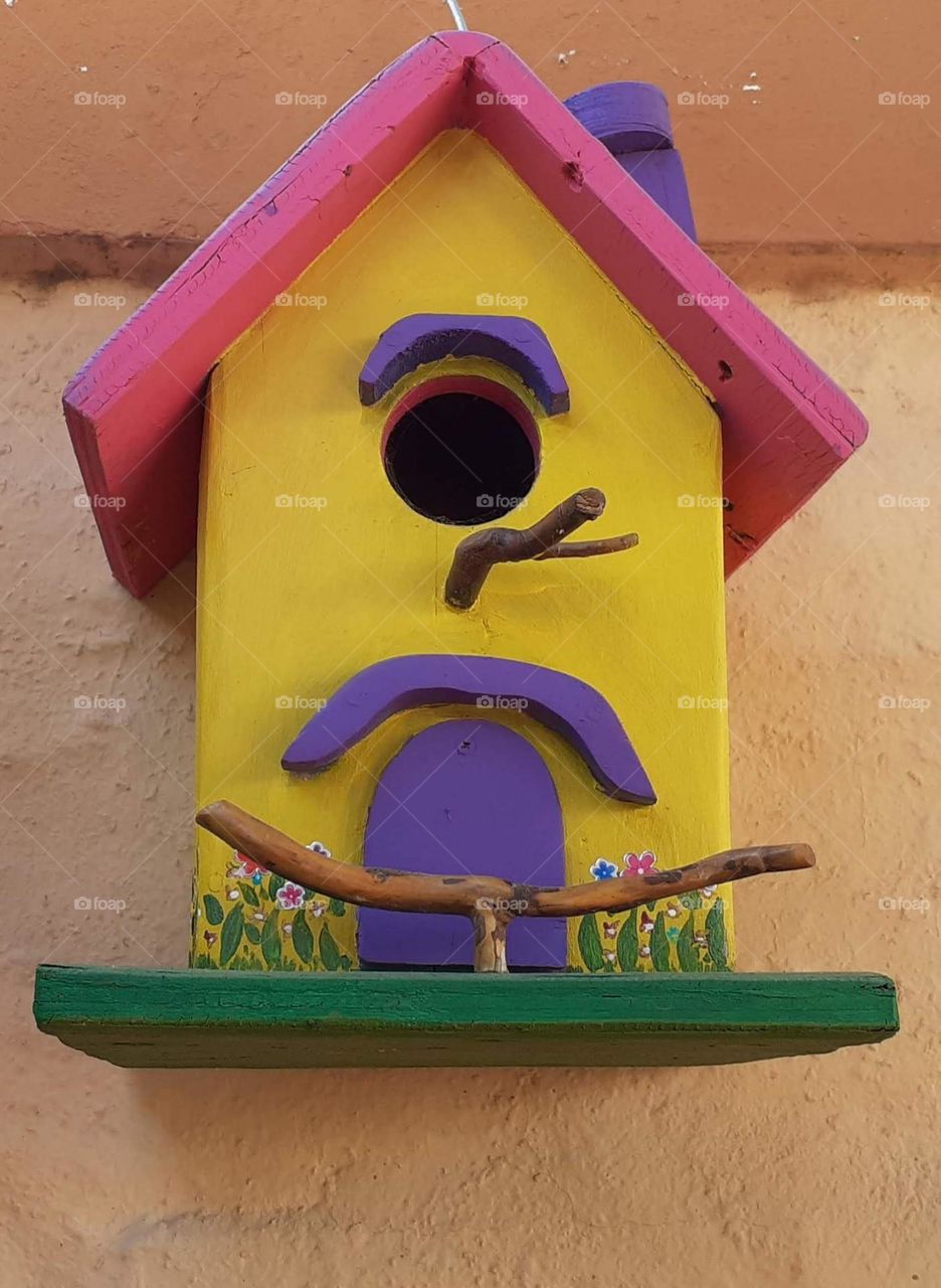 casa para pájaros de madera