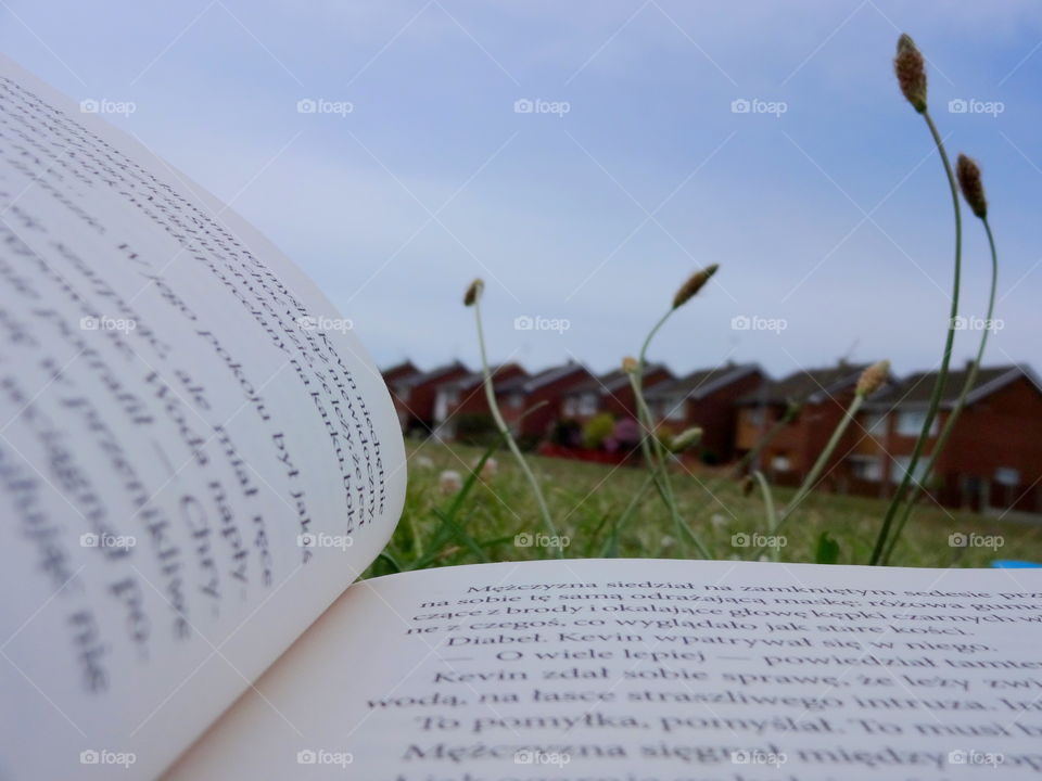 reading the book outside