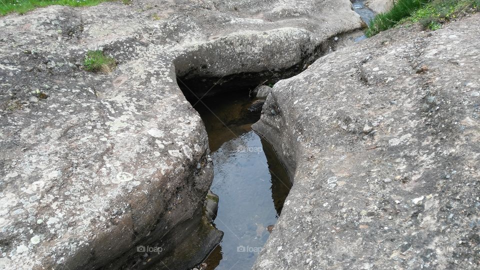 rock and water. rock modelated by a little river